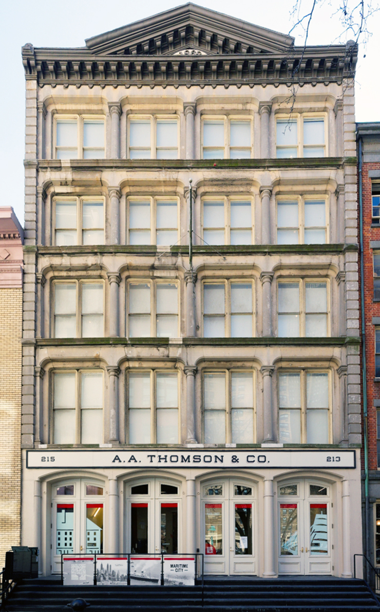 The Italianate cast-iron and stone warehouse at 213-215 Water Street, designed by Stephen D. Hatch in 1868 for the A.A. Thomson & Co. The building was restored and converted into an exhibition space for the South Street Seaport Museum by the preservation architecture firm Beyer Blinder Belle. Photo: Carl Glassman/Tribeca Trib